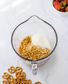 No Bake Strawberry Pretzel Pie crust ingredients in bowl