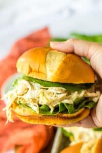 Slow Cooker Chicken Caesar Sandwiches in hand