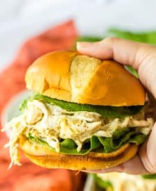 Slow Cooker Chicken Caesar Sandwiches in hand