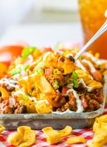 Slow Cooker Frito Pie plated in tray