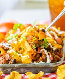 Slow Cooker Frito Pie plated in tray