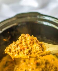 Slow Cooker Rotel Tacos being spooned out of slow cooker
