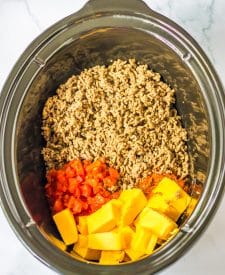 Slow Cooker Rotel Tacos ingredients in slow cooker