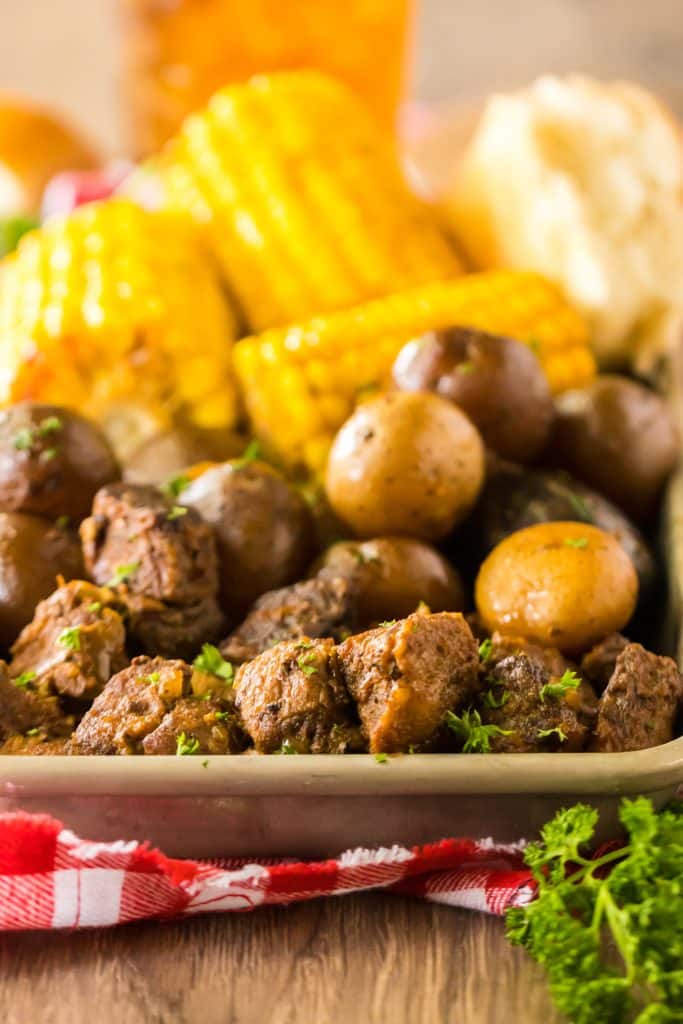 Slow Cooker Steak, Potatoes and Corn in tray