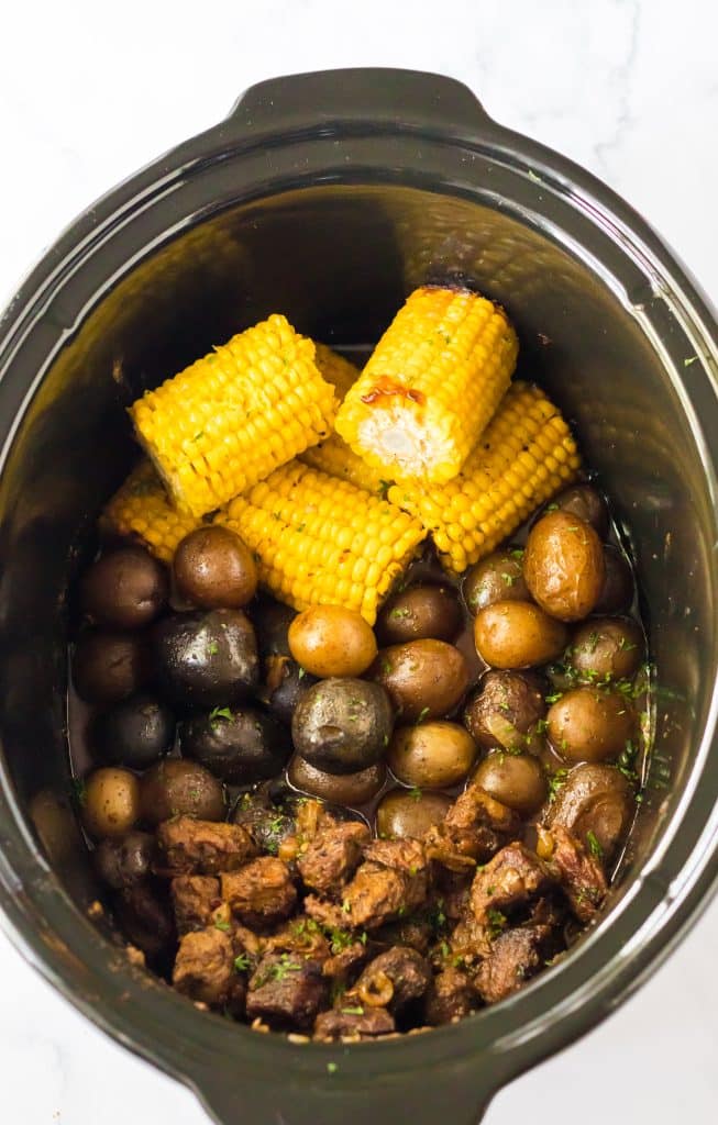 Slow Cooker Steak, Potatoes and Corn in slow cooker