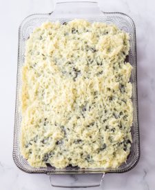 Almond Joy Poke Cake with coconut filling