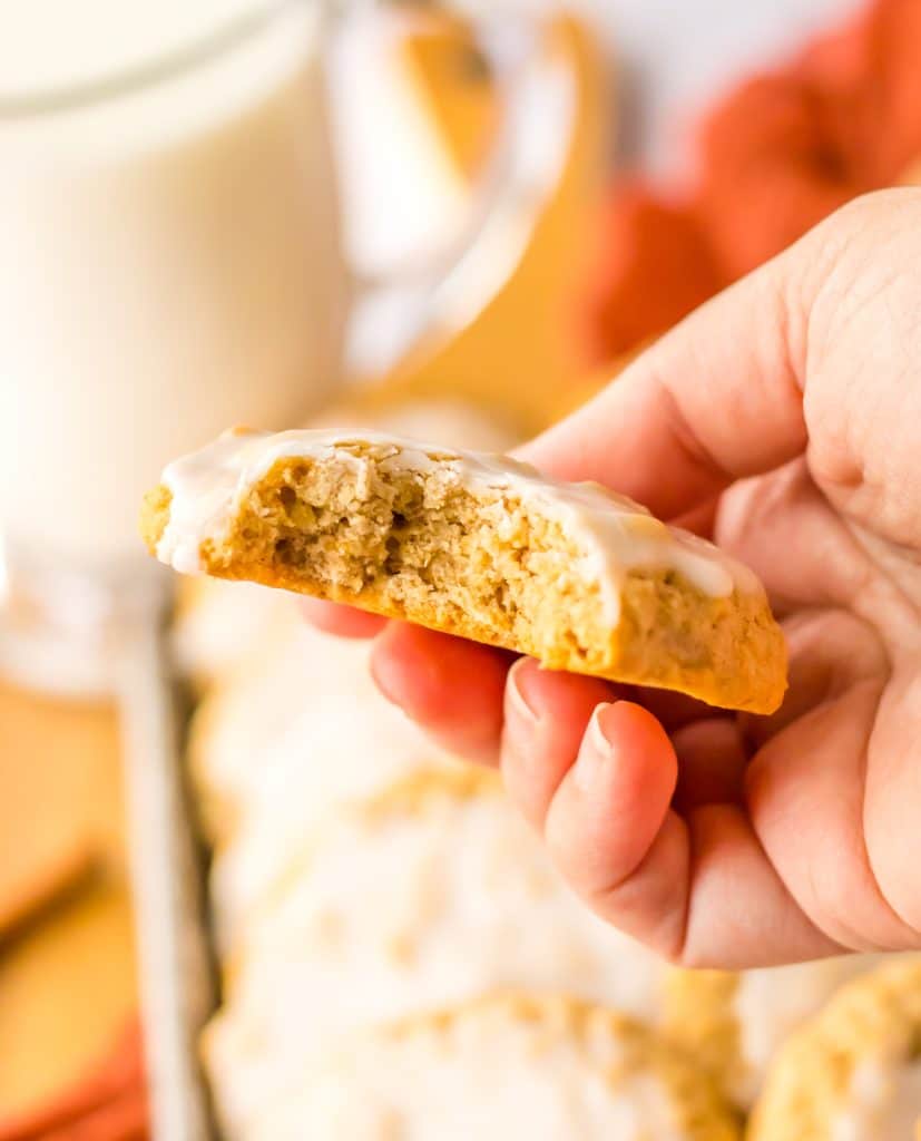 Old Fashion Iced Oatmeal Cookies with bite taken out