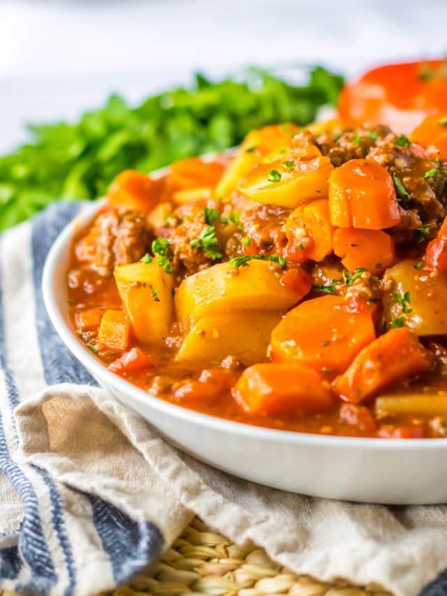 Hearty bowl of slow cooker poor man’s stew with ground beef, potatoes, and carrots
