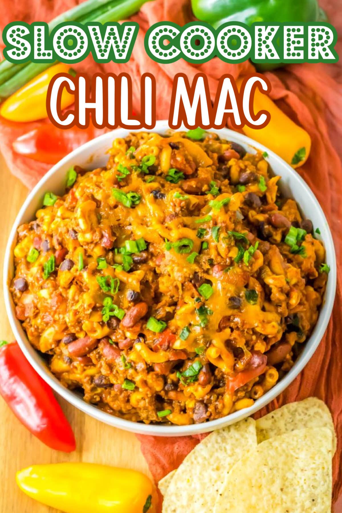 Slow cooker chili mac with ground beef, pasta, and melted cheese in a hearty tomato sauce