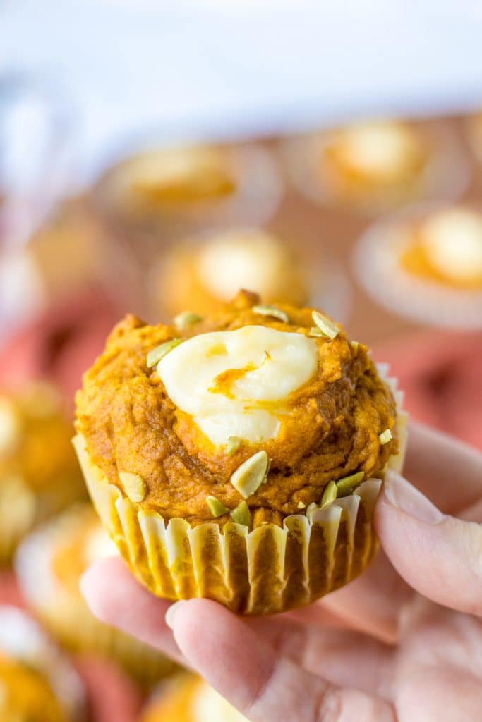 Copycat Starbucks Pumpkin Cream Cheese Muffins in hand
