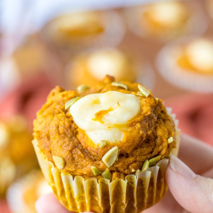 Copycat Starbucks Pumpkin Cream Cheese Muffins in hand