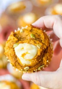 Copycat Starbucks Pumpkin Cream Cheese Muffins in hand