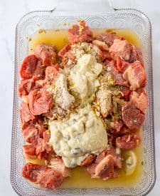 Best Ever Oven Beef Tips ingredients in pan