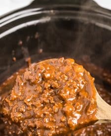 Slow Cooker Cincinnati Chili in spoon in slow cooker