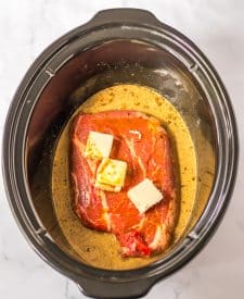 Slow Cooker Roast Beef Po Boy in slow cooker