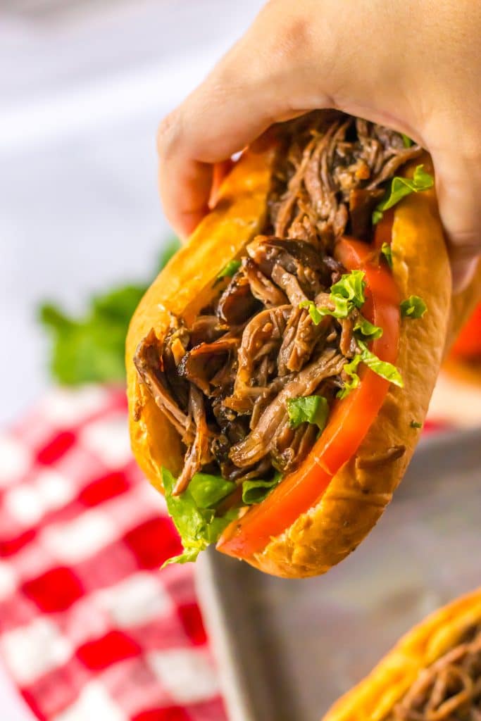 Slow Cooker Roast Beef Po Boy in hand