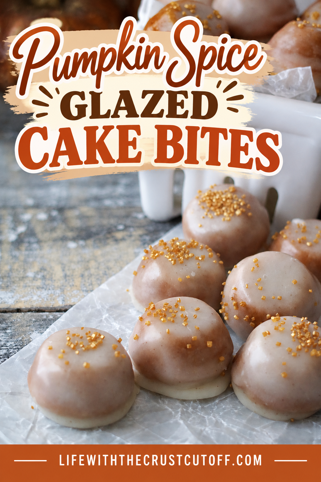 Pumpkin Spice Glazed Cake Bites covered in a light brown glaze and topped with gold sprinkles, arranged on parchment paper beside a white ceramic basket.