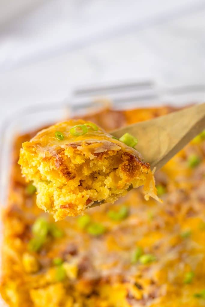 Loaded Cornbread Casserole in spoon