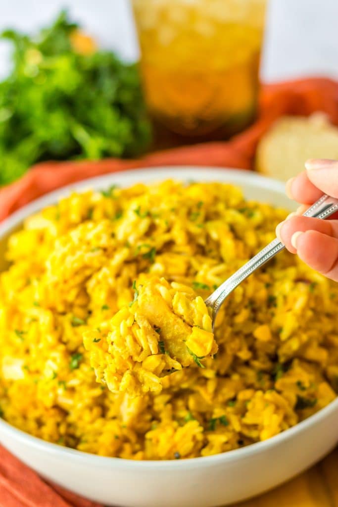 Slow Cooker Cheesy Chicken Rice in spoon