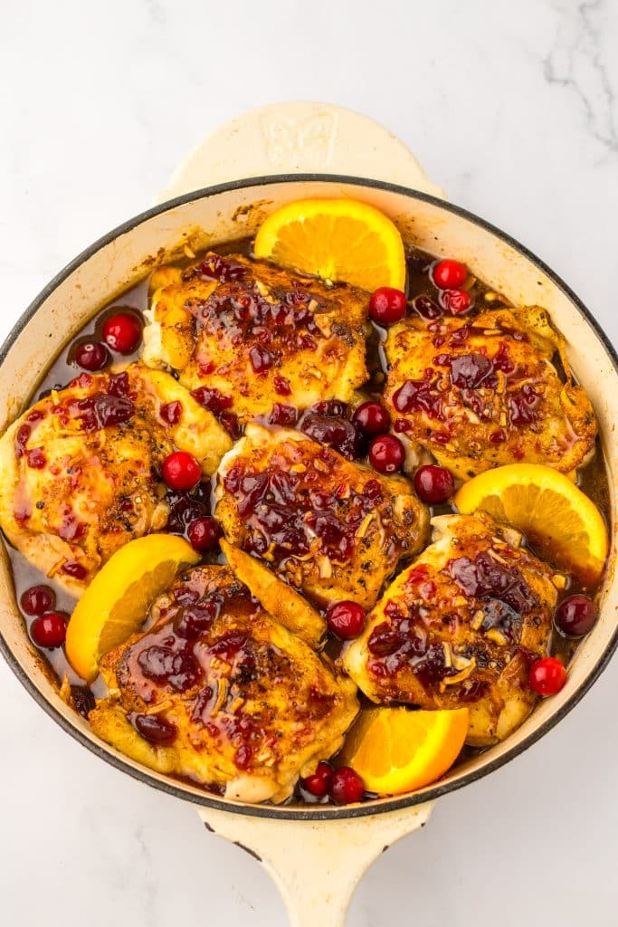 Cranberry Chicken Thighs ingredients in skillet