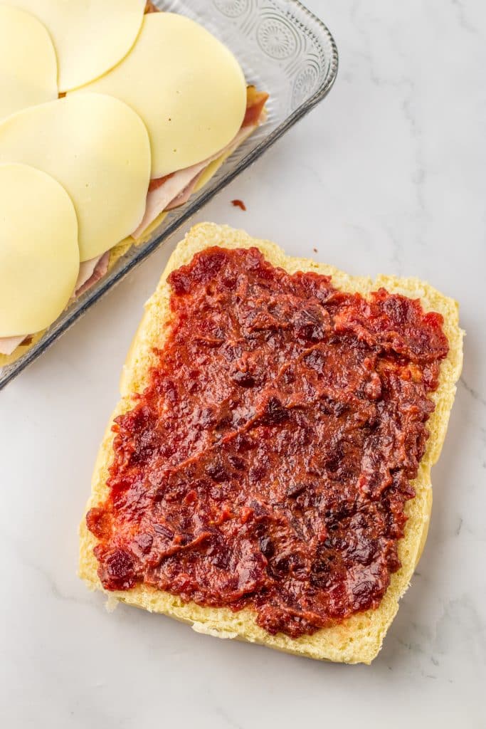 Cranberry Club Sliders cranberry sauce on rolls