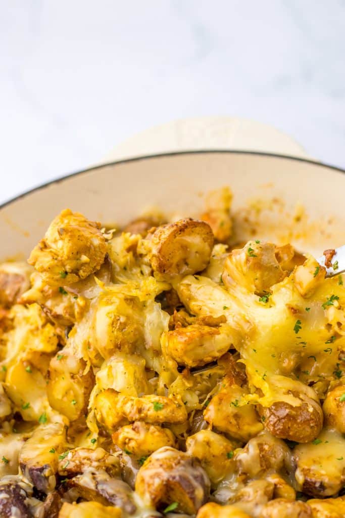 Garlic Parm Chicken & Potatoes in spoon