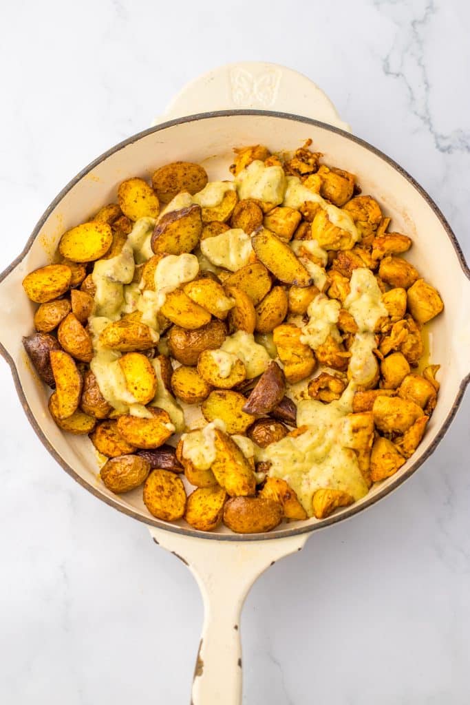 Garlic Parm Chicken & Potatoes in sauce