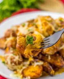 Garlic Parm Chicken & Potatoes on fork