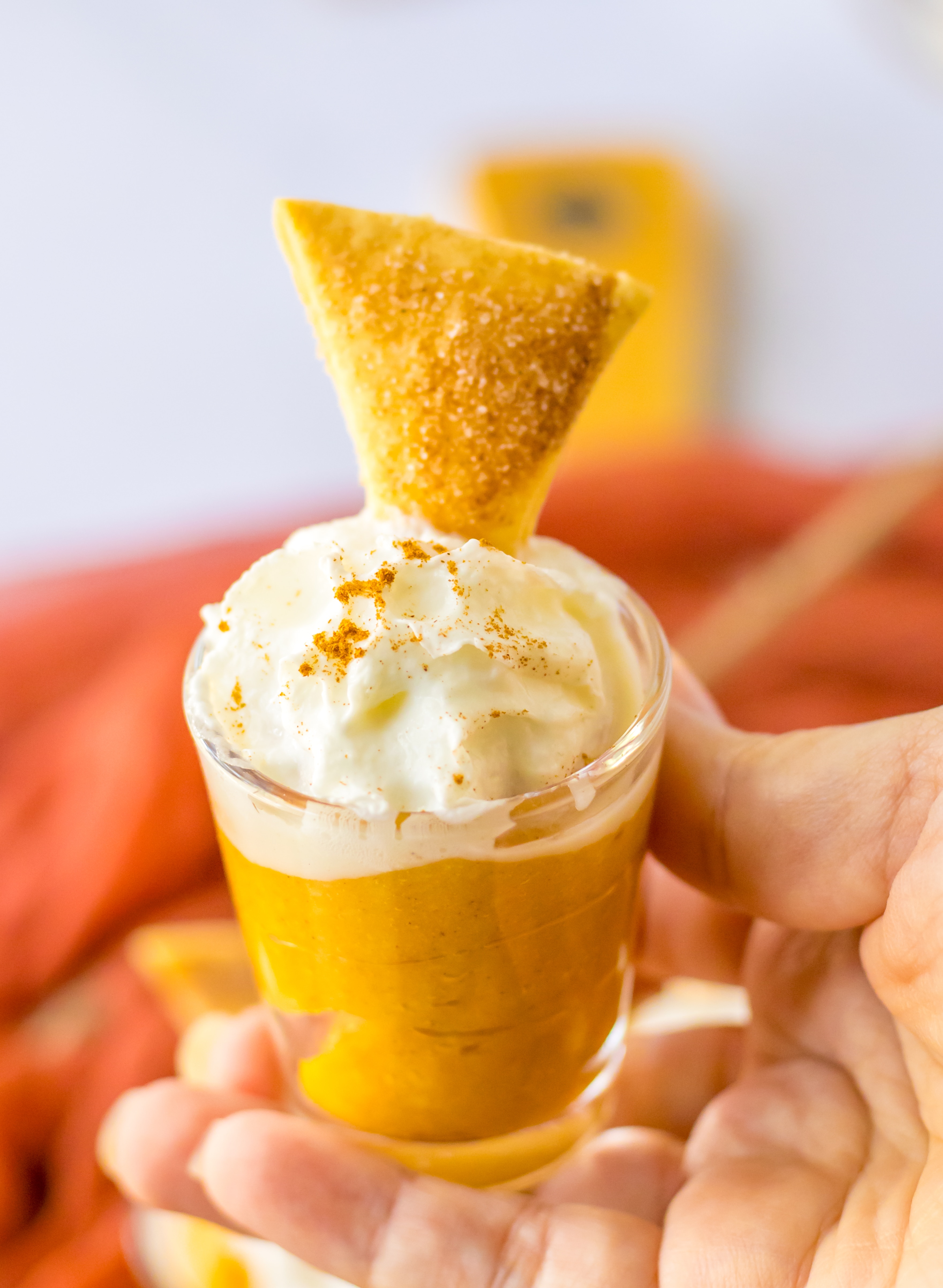 Pumpkin Pie Pudding Shots in hand