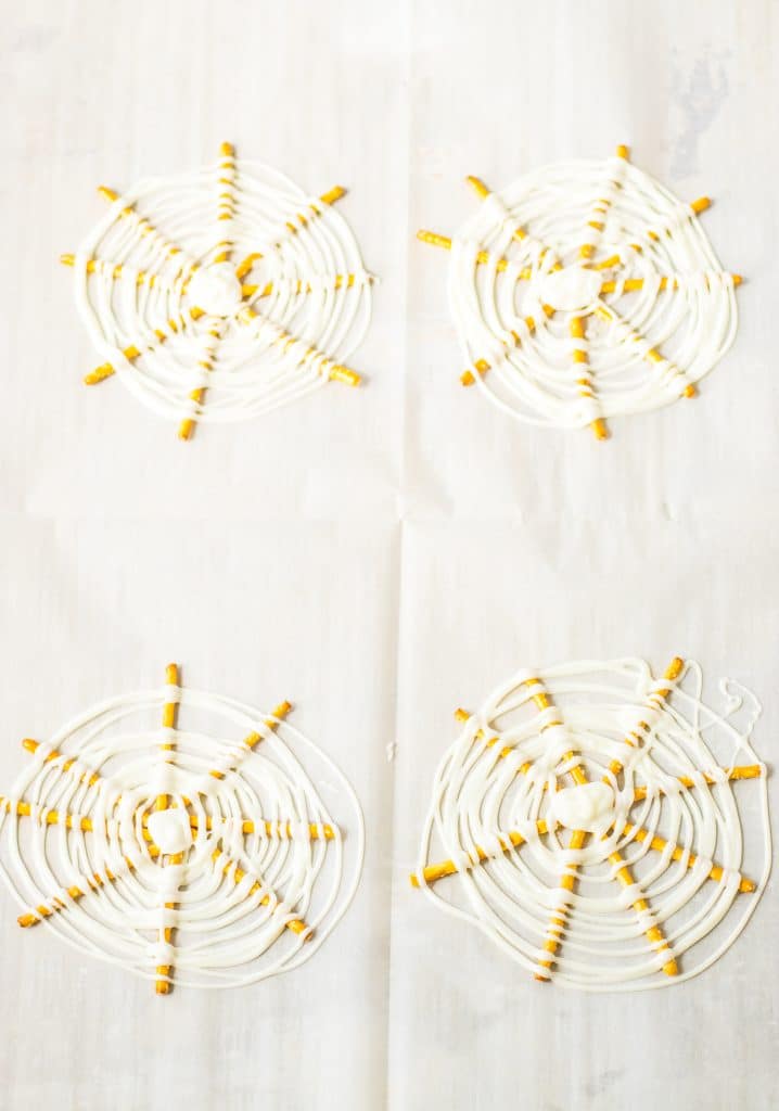 Spiderweb Pretzel Bark with chocolate