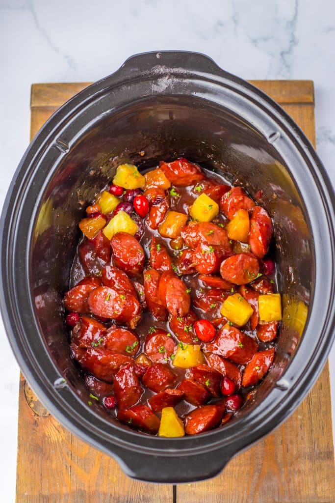 Slow Cooker Cranberry Pineapple Kielbasa Bites in slow cooker