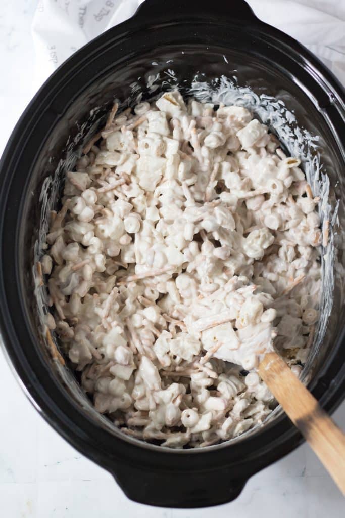 Peppermint Crockpot Candy ingredients in slow cooker mixed