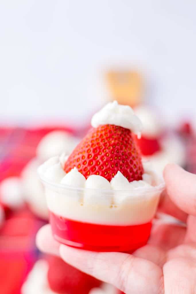 Santa Hat Jello Shots in hand