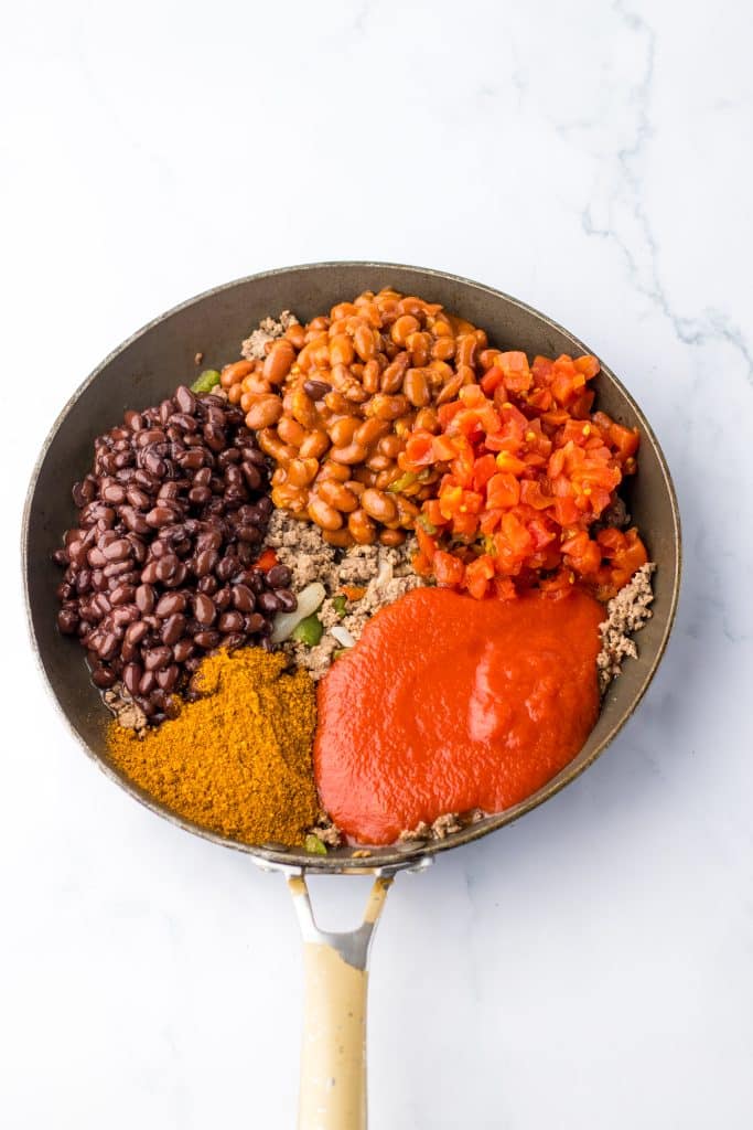 Chili Cheese Stuffed Shells in pan