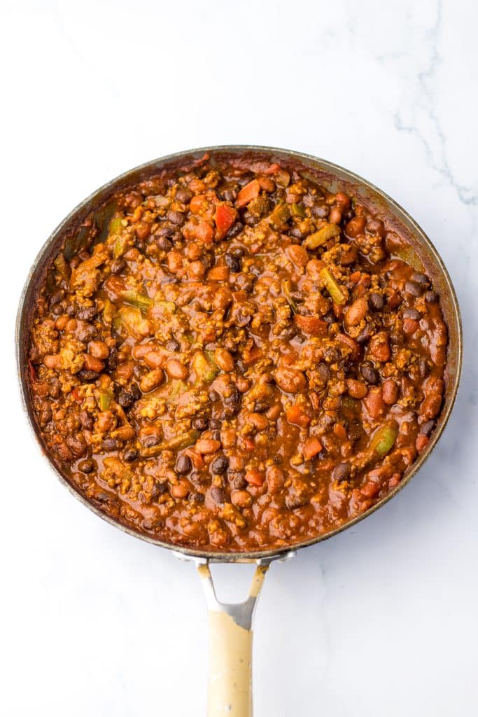 Chili Cheese Stuffed Shells in pan