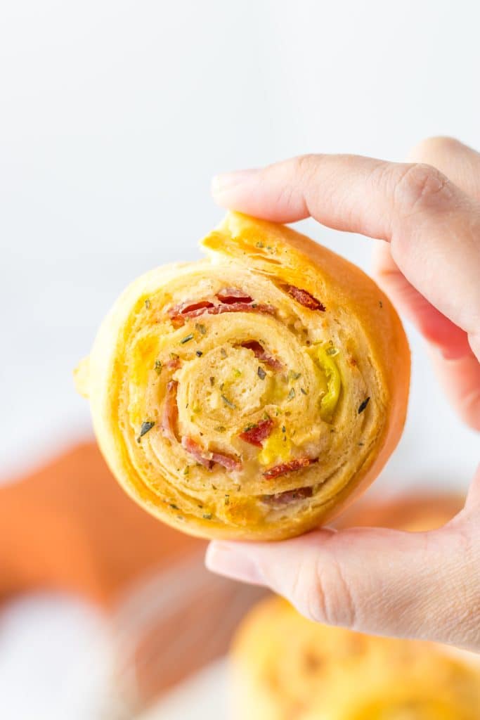 Italian Sub Pinwheels in hand