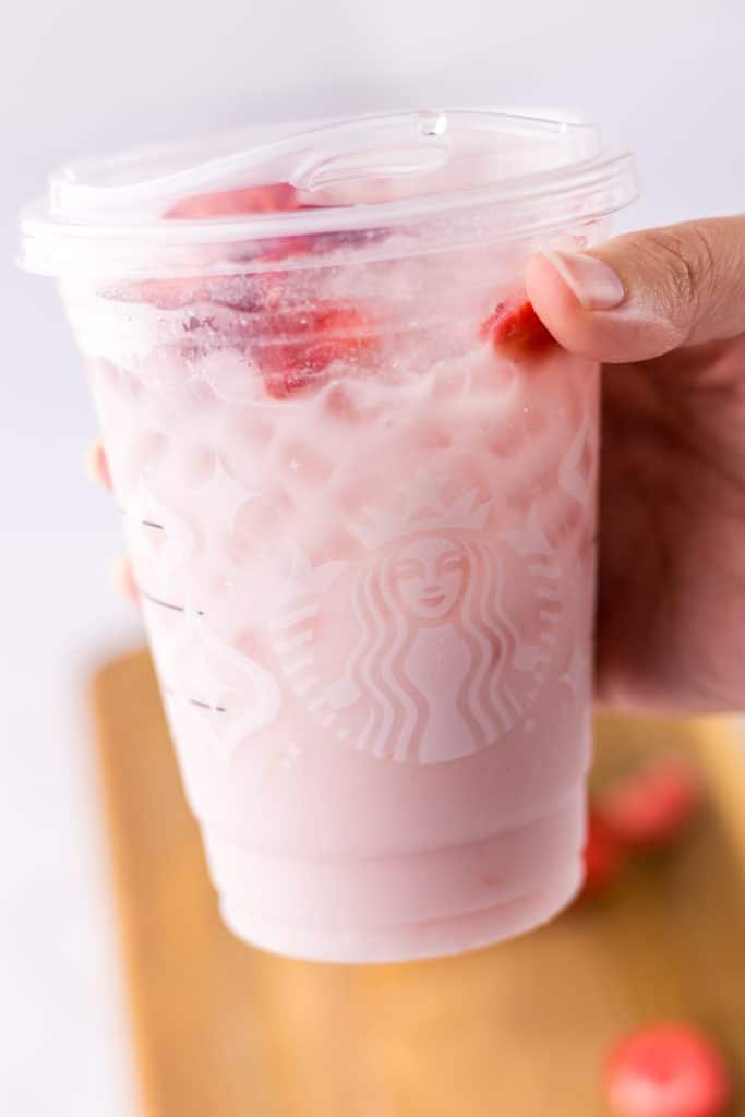 Starbucks Pink Drink in hand