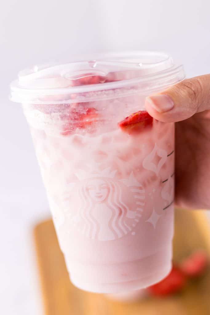 Starbucks Pink Drink in hand
