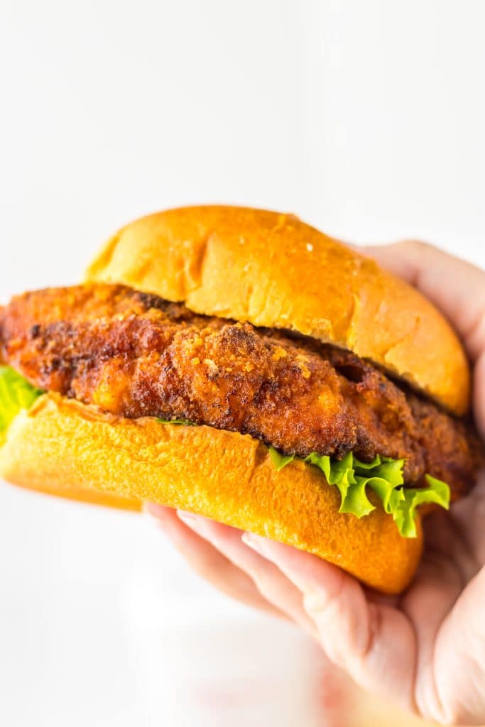 Copycat Chick Fil A Sandwiches in hand