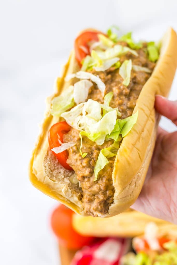 Slow Cooker Chopped Cheese Sandwiches in hand