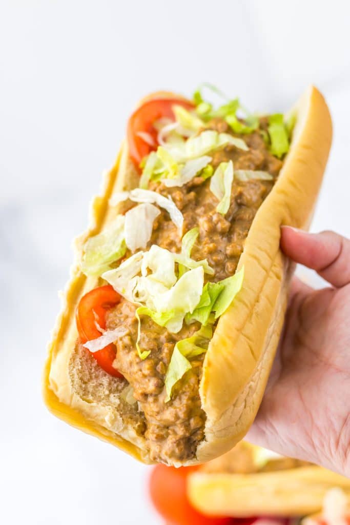 Slow Cooker Chopped Cheese Sandwiches in hand