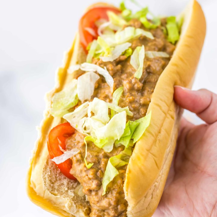 Slow Cooker Chopped Cheese Sandwiches in hand