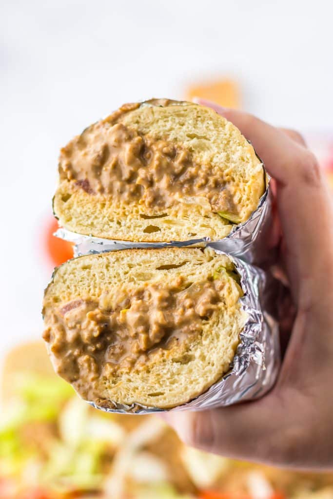 Slow Cooker Chopped Cheese Sandwiches in half
