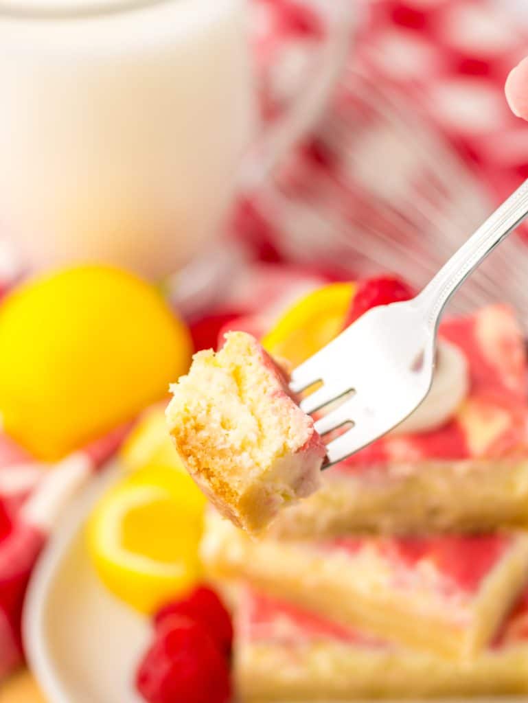 Raspberry Lemon Cheesecake Bars on fork