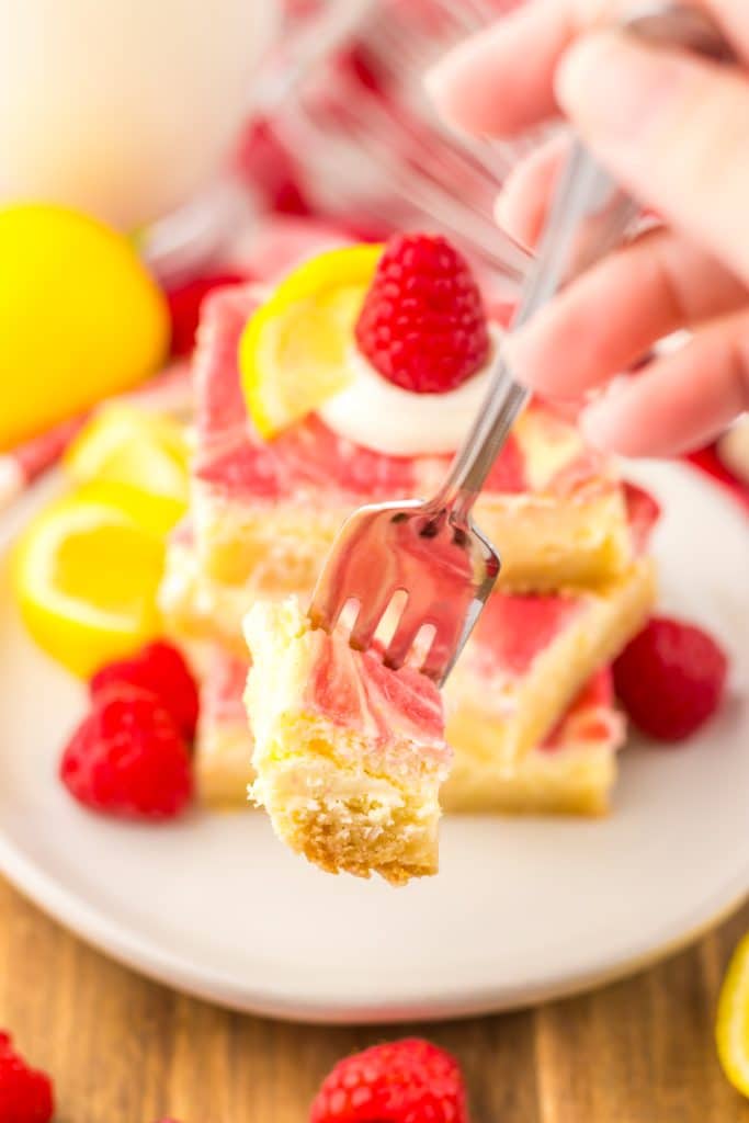 Raspberry Lemon Cheesecake Bars on fork
