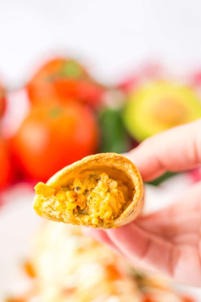 Baked Chicken Taquitos in hand