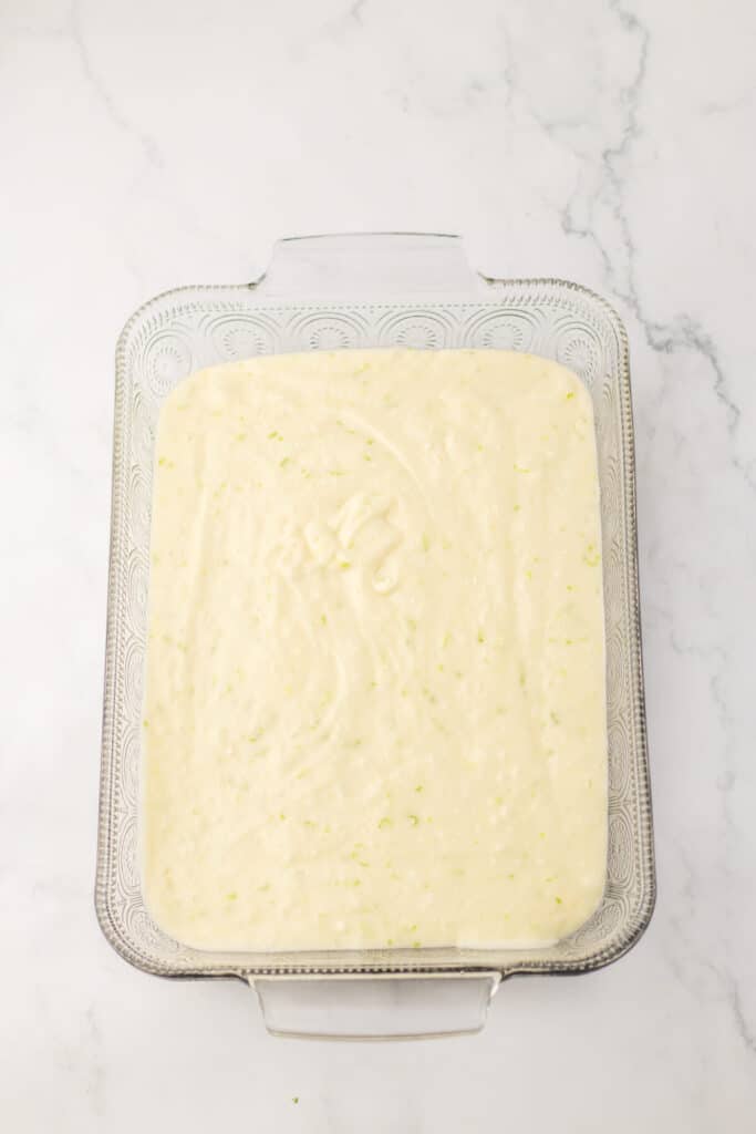 Cherry Limeade Poke Cake batter in pan