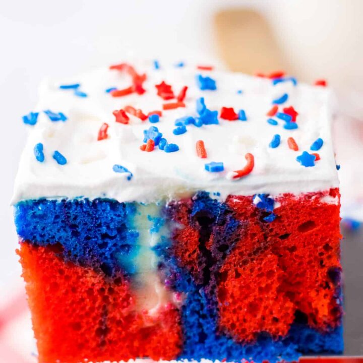 Red White Blue Poke Cake on spatula