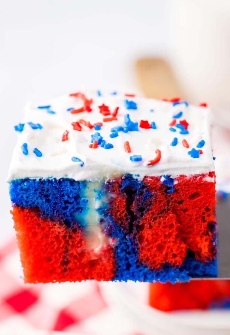 Red White Blue Poke Cake on spatula