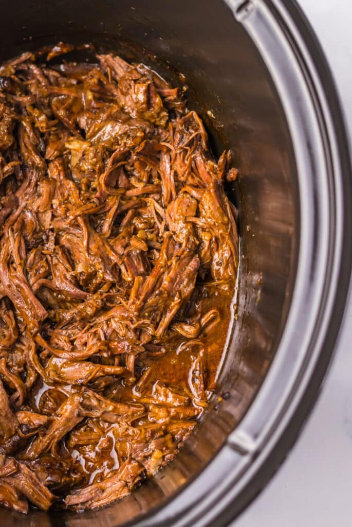 Slow Cooker Arbys Roast Beef and Cheddar Sandwiches shredded beef